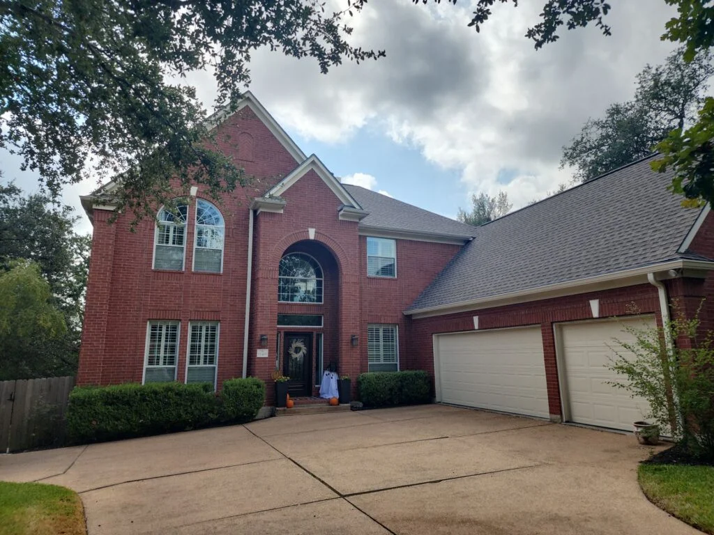New architectural shingle roof with ridge vent and clean flashing